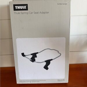 Thule Spring Car Seat Adapter in Black and Gray